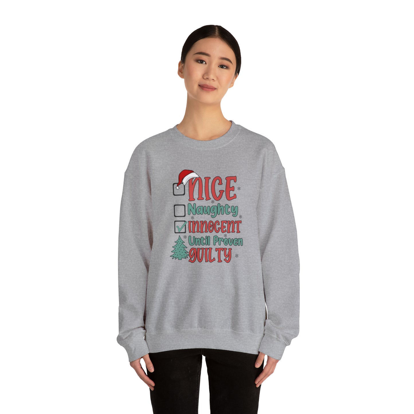 Innocent Until Proven Guilty Christmas Heavy Blend™ Crewneck Sweatshirt